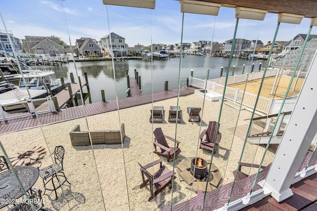 1639 Bay Blvd, Ortley Beach, NJ 08751 - dock with an outdoor fire pit, a water view, and a residential view