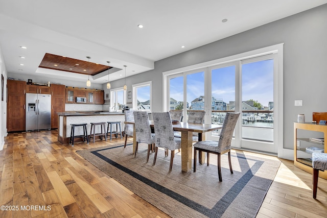 1639 Bay Blvd, Ortley Beach, NJ 08751 - dining area with a raised ceiling, light wood-type flooring, and recessed lighting