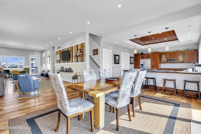 1639 Bay Blvd, Ortley Beach, NJ 08751 - dining space featuring light wood-type flooring, recessed lighting, and a raised ceiling