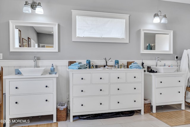 1639 Bay Blvd, Ortley Beach, NJ 08751 - full bath featuring two vanities, a wainscoted wall, and tile patterned flooring