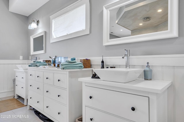 1639 Bay Blvd, Ortley Beach, NJ 08751 - full bath with vanity, a wainscoted wall, and tile patterned flooring
