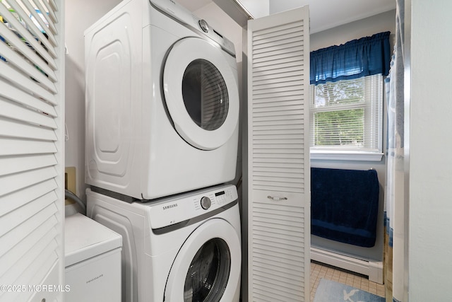 33 Oak Ln, Little Egg Harbor, NJ 08087 - laundry room featuring stacked washer and clothes dryer and light tile patterned flooring
