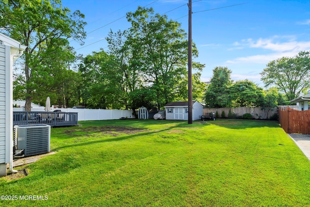 33 Oak Ln, Little Egg Harbor, NJ 08087 - view of yard with cooling unit and a wooden deck