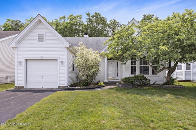 18 Valley Stream Pl, Barnegat, NJ 08005 - view of front of house featuring a front lawn, asphalt driveway, a chimney, and roof with shingles