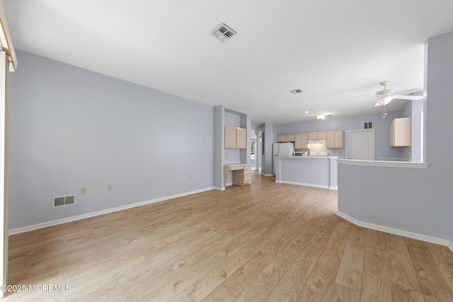18 Valley Stream Pl, Barnegat, NJ 08005 - unfurnished living room with light wood-type flooring, a ceiling fan, and baseboards