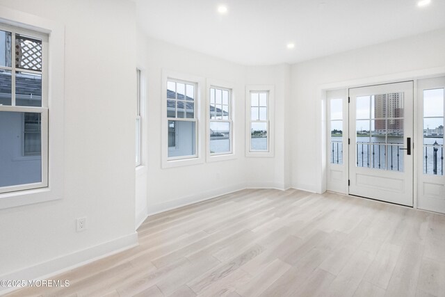 205 Edgemont Dr Unit 2, Loch Arbour Village, NJ 07711 - unfurnished room featuring plenty of natural light, light wood finished floors, recessed lighting, and baseboards