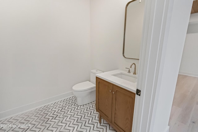 205 Edgemont Dr Unit 2, Loch Arbour Village, NJ 07711 - bathroom with toilet, vanity, and baseboards