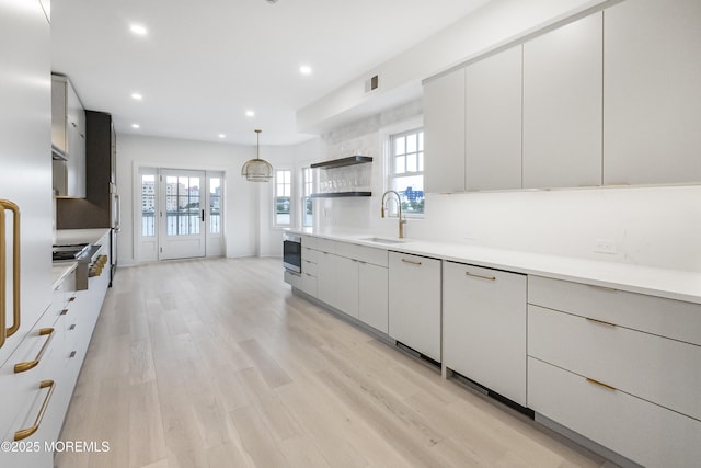 205 Edgemont Dr Unit 2, Loch Arbour Village, NJ 07711 - kitchen featuring a sink, open shelves, modern cabinets, light countertops, and recessed lighting