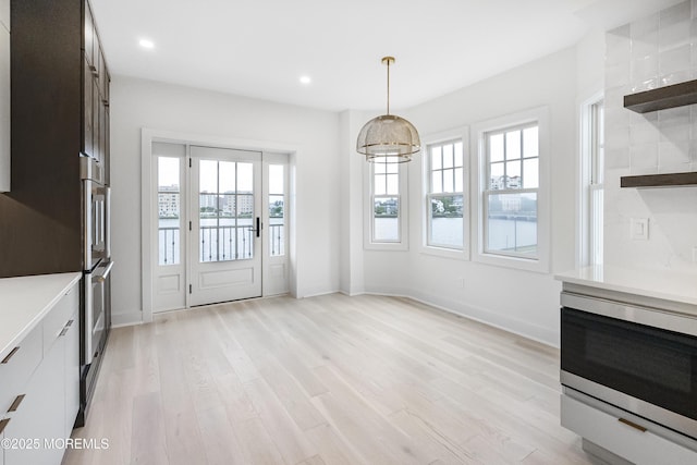 205 Edgemont Dr Unit 2, Loch Arbour Village, NJ 07711 - unfurnished dining area with light wood-type flooring, recessed lighting, and baseboards