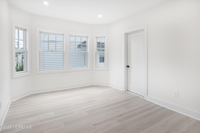 205 Edgemont Dr Unit 2, Loch Arbour Village, NJ 07711 - empty room featuring light wood finished floors, baseboards, and recessed lighting