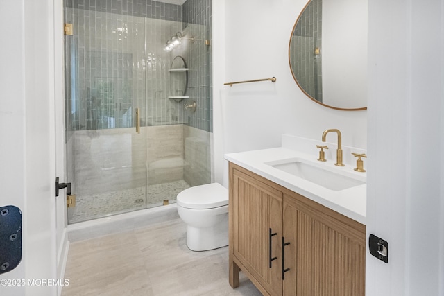 205 Edgemont Dr Unit 2, Loch Arbour Village, NJ 07711 - bathroom featuring vanity, toilet, and a stall shower