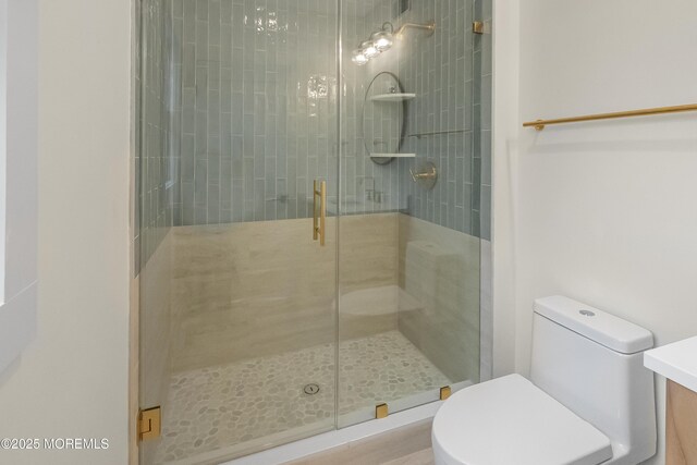 205 Edgemont Dr Unit 2, Loch Arbour Village, NJ 07711 - bathroom featuring toilet, a stall shower, and vanity