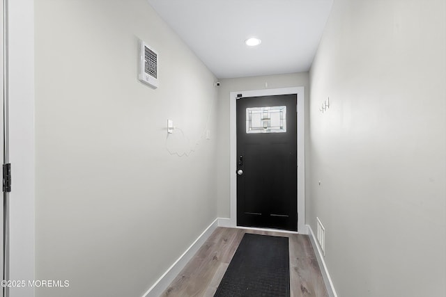 72 4th St, Highlands, NJ 07732 - entryway with baseboards, light wood finished floors, and recessed lighting
