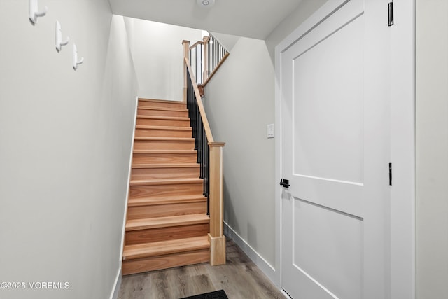 72 4th St, Highlands, NJ 07732 - stairs featuring wood finished floors and baseboards