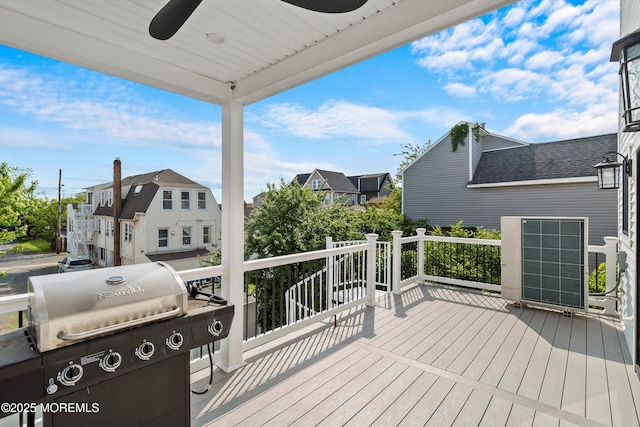 72 4th St, Highlands, NJ 07732 - deck featuring area for grilling, a residential view, and a ceiling fan