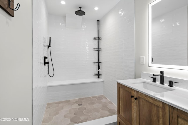 72 4th St, Highlands, NJ 07732 - bathroom featuring vanity, tiled shower, tile patterned flooring, and recessed lighting