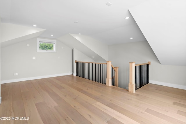 72 4th St, Highlands, NJ 07732 - additional living space with lofted ceiling, light wood-style floors, recessed lighting, and baseboards