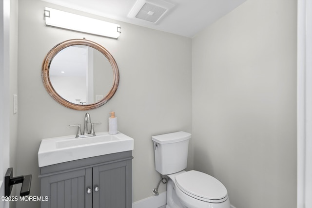 72 4th St, Highlands, NJ 07732 - bathroom with baseboards, toilet, and vanity