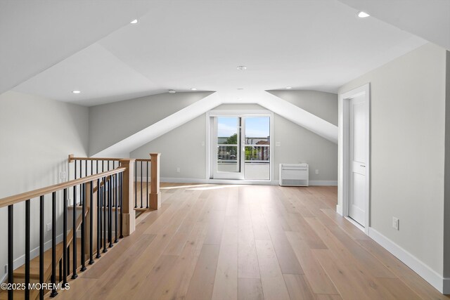 72 4th St, Highlands, NJ 07732 - additional living space with light wood-style flooring, baseboards, lofted ceiling, and recessed lighting
