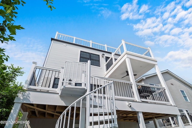 72 4th St, Highlands, NJ 07732 - rear view of property with a balcony, stairway, and a deck