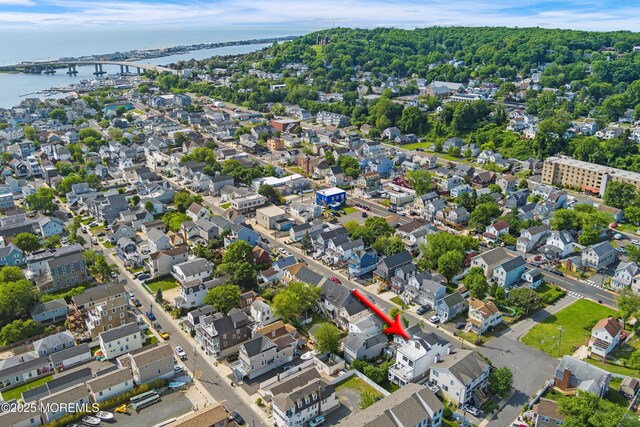 72 4th St, Highlands, NJ 07732 - aerial view of property and surrounding area with a notable bridge, a nearby body of water, and nearby suburban area