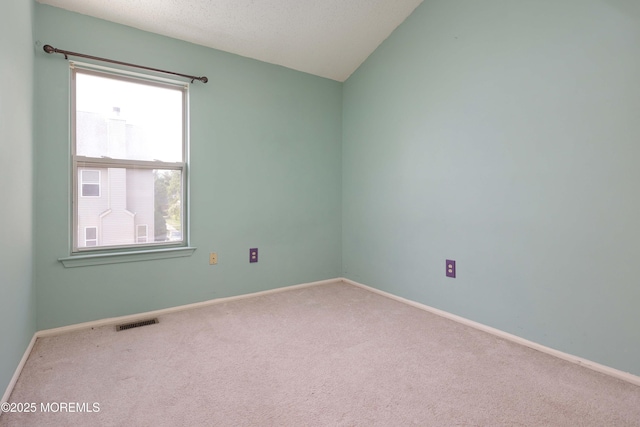 62 Cohasset Ct, Holmdel, NJ 07733 - carpeted spare room with baseboards and vaulted ceiling