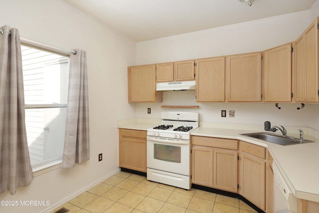 62 Cohasset Ct, Holmdel, NJ 07733 - kitchen with white appliances, light brown cabinetry, under cabinet range hood, a sink, and light countertops