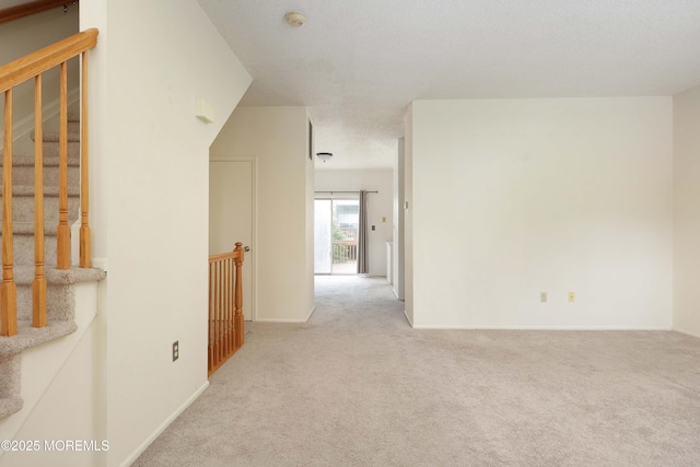 62 Cohasset Ct, Holmdel, NJ 07733 - hallway featuring carpet and stairs