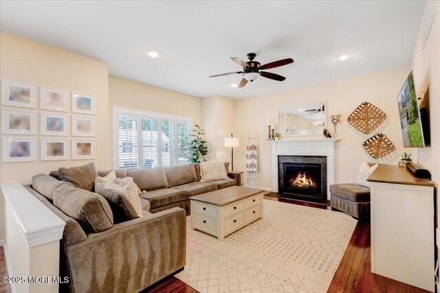 10 Unity Ct, Middletown, NJ 07748 - living room with wood finished floors, ceiling fan, a fireplace with flush hearth, and recessed lighting
