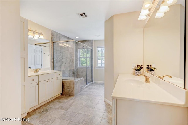 10 Unity Ct, Middletown, NJ 07748 - full bath featuring a shower stall, two vanities, baseboards, and a chandelier