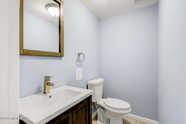 10 Unity Ct, Middletown, NJ 07748 - bathroom featuring toilet, vanity, and baseboards