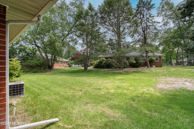 186 Laurel Pl Unit B, Whiting, NJ 08759 - view of grassy yard with cooling unit