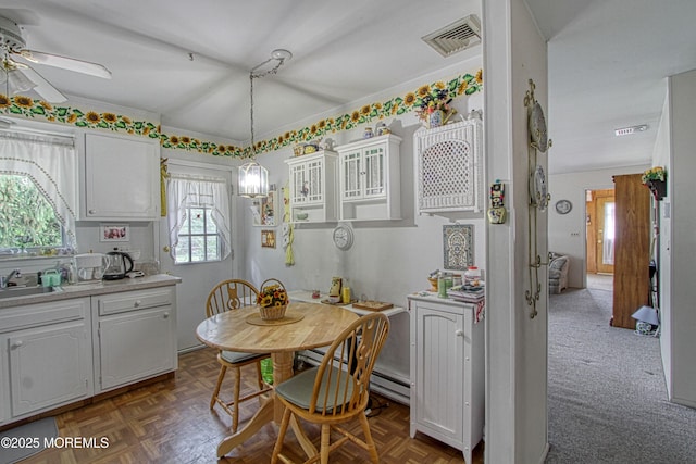 186 Laurel Pl Unit B, Whiting, NJ 08759 - dining area featuring a ceiling fan and a baseboard heating unit