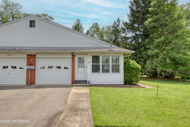 186 Laurel Pl Unit B, Whiting, NJ 08759 - view of front of house with asphalt driveway, a front lawn, and a garage