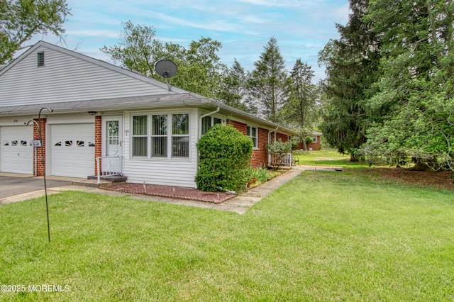 186 Laurel Pl Unit B, Whiting, NJ 08759 - view of property exterior featuring concrete driveway, a lawn, and a garage
