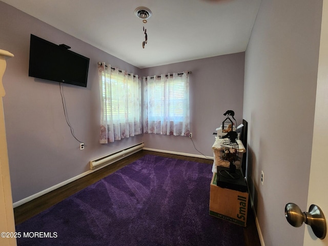 10-A Snowberry Ln, Whiting, NJ 08759 - bedroom with a baseboard heating unit, wood finished floors, and baseboards