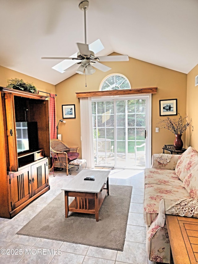 12 Skylark Ln, Lakewood, NJ 08701 - living room featuring a skylight, a ceiling fan, vaulted ceiling, and light tile patterned flooring