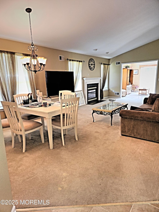 12 Skylark Ln, Lakewood, NJ 08701 - dining space featuring carpet, a chandelier, plenty of natural light, and lofted ceiling
