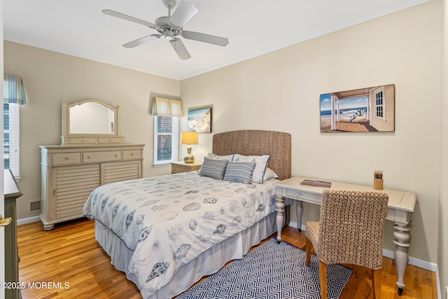 7 Brown Ave, Lavallette, NJ 08735 - bedroom with light wood-style flooring, ornamental molding, baseboards, and ceiling fan