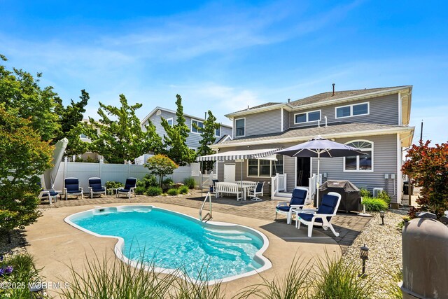 7 Brown Ave, Lavallette, NJ 08735 - rear view of house with a patio and a fenced backyard