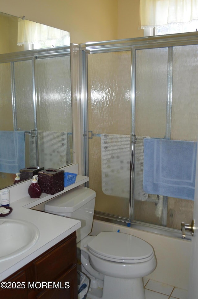 38 Sheffield Dr, Forked River, NJ 08731 - full bathroom with vanity, bath / shower combo with glass door, and tile patterned flooring