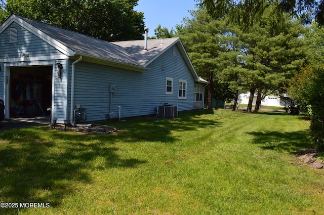 38 Sheffield Dr, Forked River, NJ 08731 - view of side of home featuring a lawn and a shingled roof