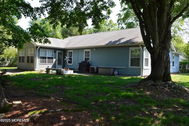 38 Sheffield Dr, Forked River, NJ 08731 - back of property featuring a lawn