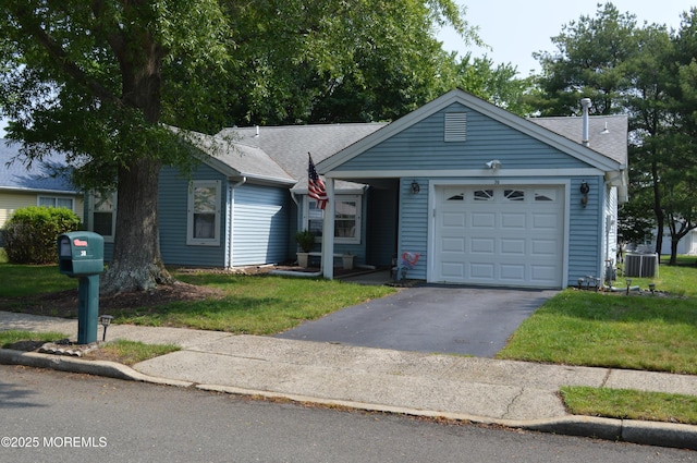 38 Sheffield Dr, Forked River, NJ 08731 - ranch-style home with asphalt driveway, a garage, a front lawn, and roof with shingles