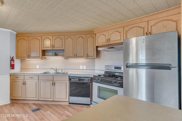 23 Southwind Cir, Jackson, NJ 08527 - kitchen featuring appliances with stainless steel finishes, under cabinet range hood, light brown cabinets, a sink, and ornamental molding
