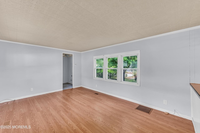 23 Southwind Cir, Jackson, NJ 08527 - empty room featuring wood finished floors, ornamental molding, and baseboards