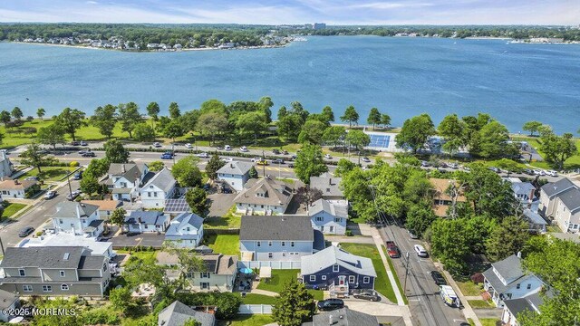 1208 Pine Tree Way, Belmar, NJ 07719 - aerial overview of property's location featuring a large body of water and nearby suburban area