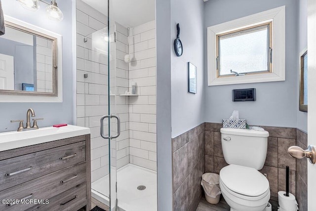 1208 Pine Tree Way, Belmar, NJ 07719 - full bath featuring tile walls, a shower stall, vanity, toilet, and a wainscoted wall
