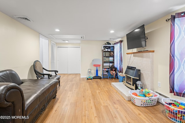 1920 W Lake Ave, Neptune Township, NJ 07753 - living area with wood finished floors, recessed lighting, and attic access