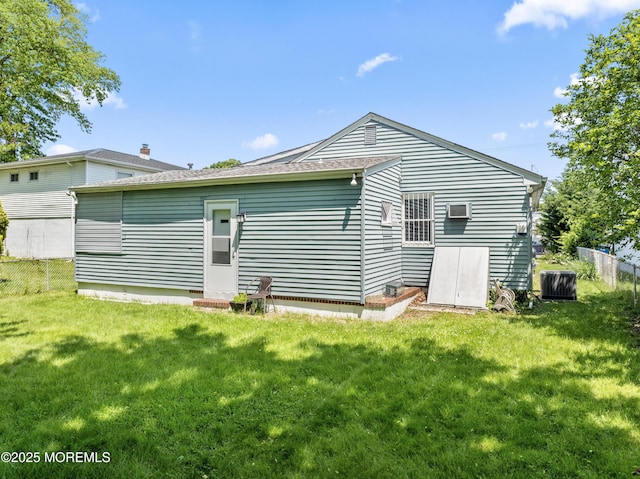 1920 W Lake Ave, Neptune Township, NJ 07753 - rear view of house with central AC and a shingled roof